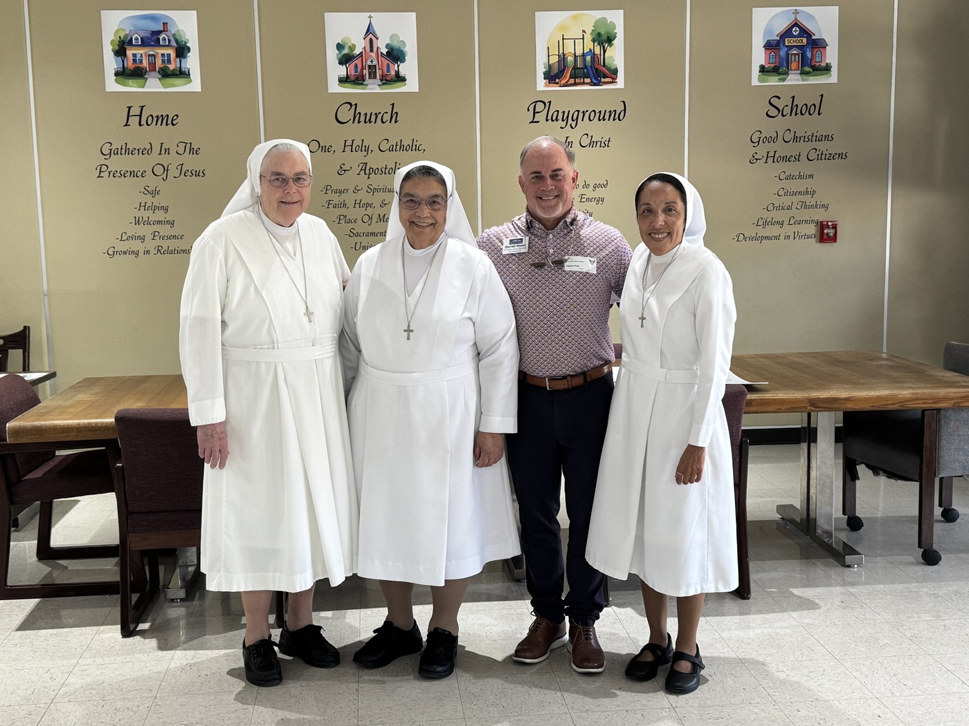 Darrell with the 'famous' Salesian Spurs Sisters; these ladies attended most Spurs basketball games, usually sitting on the floor or close to it. They became a sort of local celebrity because they were supporting the Spurs, and the Spurs went to the NBA Finals.