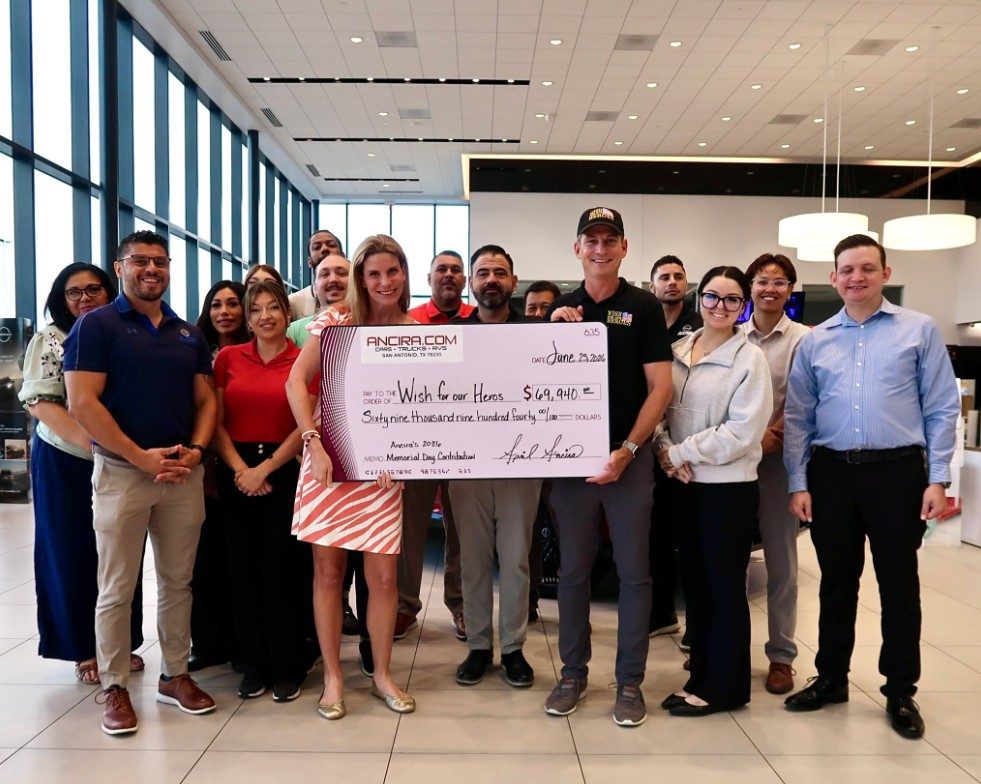 Ancira team presenting a check for $69,940 to Wish for Our Heroes