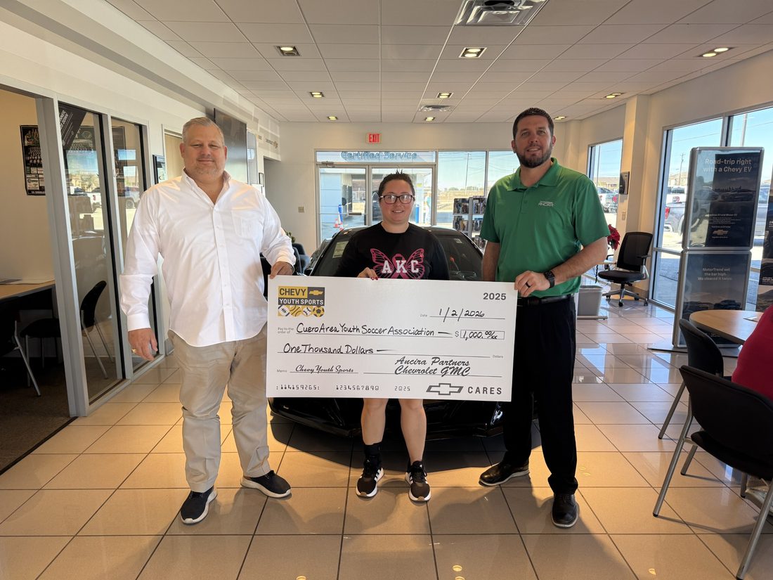 Ancira Partners presenting a $1,000 check to the Cuero Area Youth Soccer Association